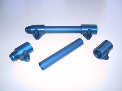 'T' fluid fittings and typical hoses